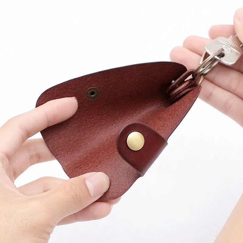 Genuine leather handmade key storage bag for car keys in black, brown, coffee, and purplish red.