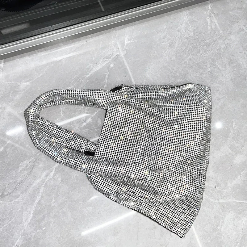Silver shiny rhinestone evening handbag with open outer pocket for women's parties.