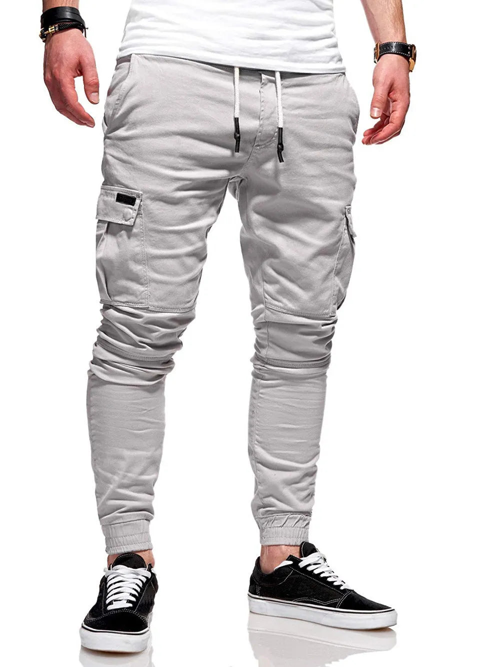 Men's light blue polyester baggy trousers with patch pockets and elastic waistband for casual leisure wear