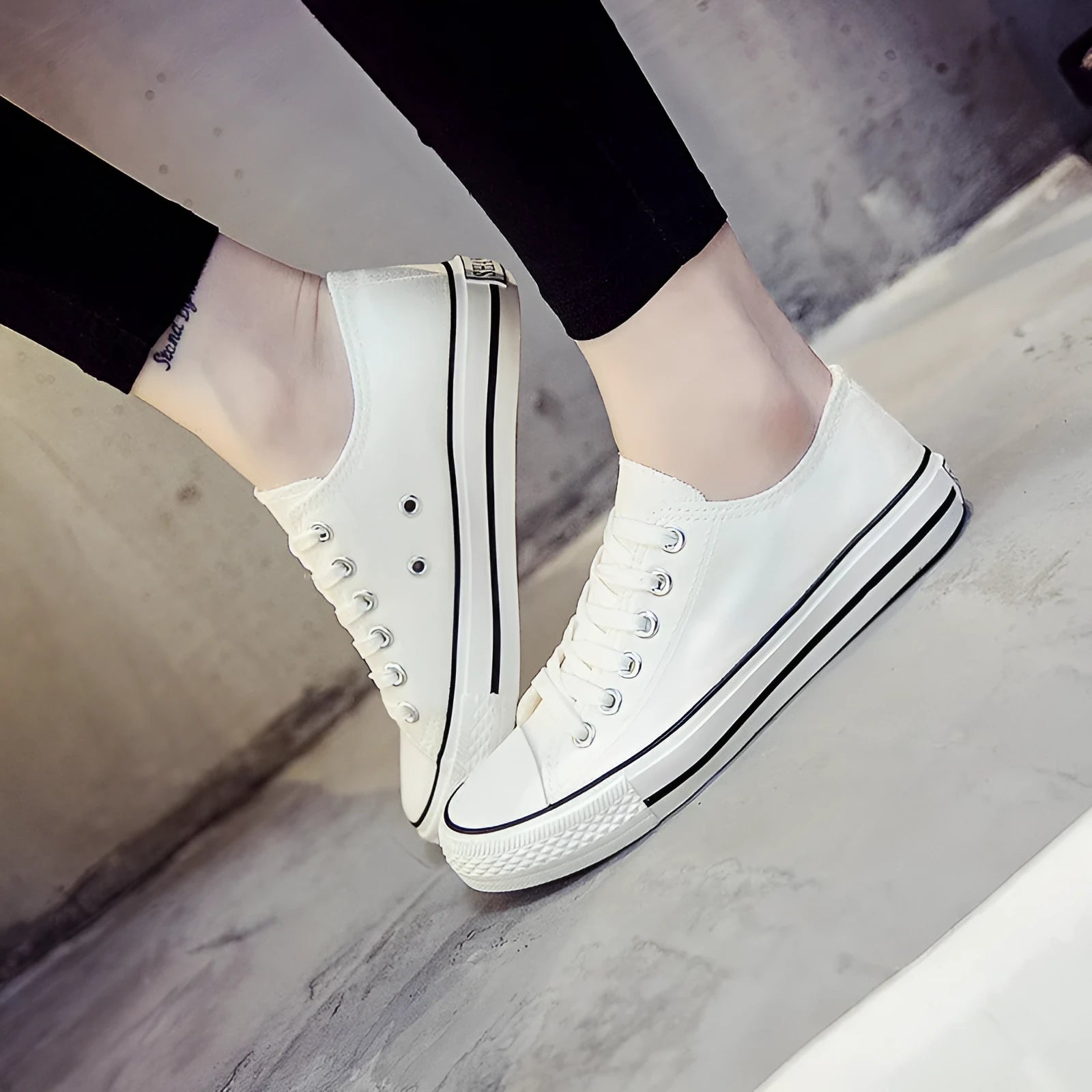 Women's solid colour canvas casual shoes in black, white black, white red, and all black colourways
