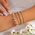 Retro pearl chain beaded bracelet set with heart shape beads in gold and white K electroplated finish
