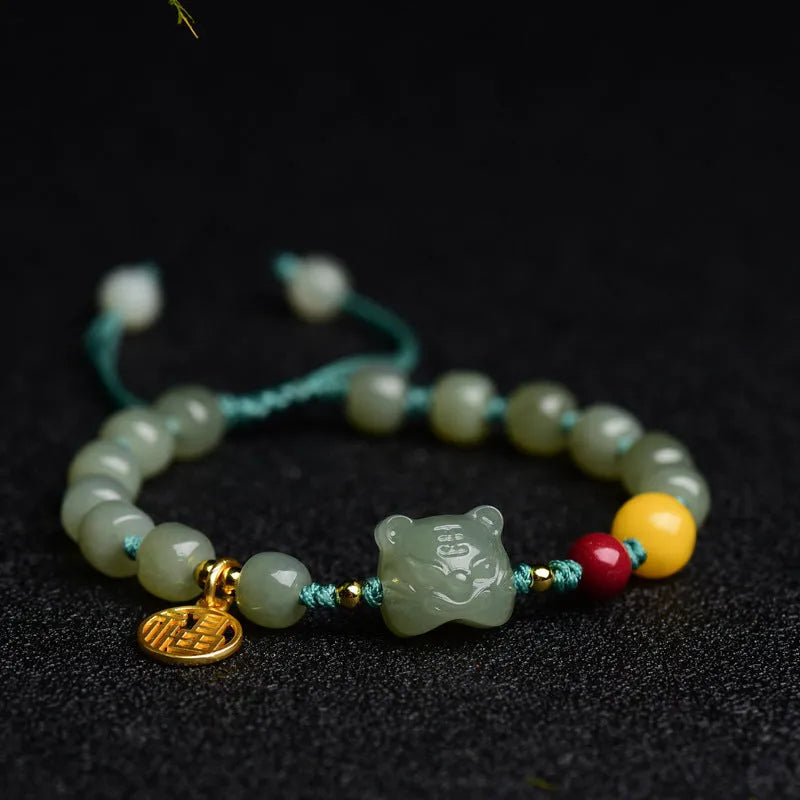 Natural Hetian jade bracelet with red cinnabar and amber beeswax beads, animal zodiac design