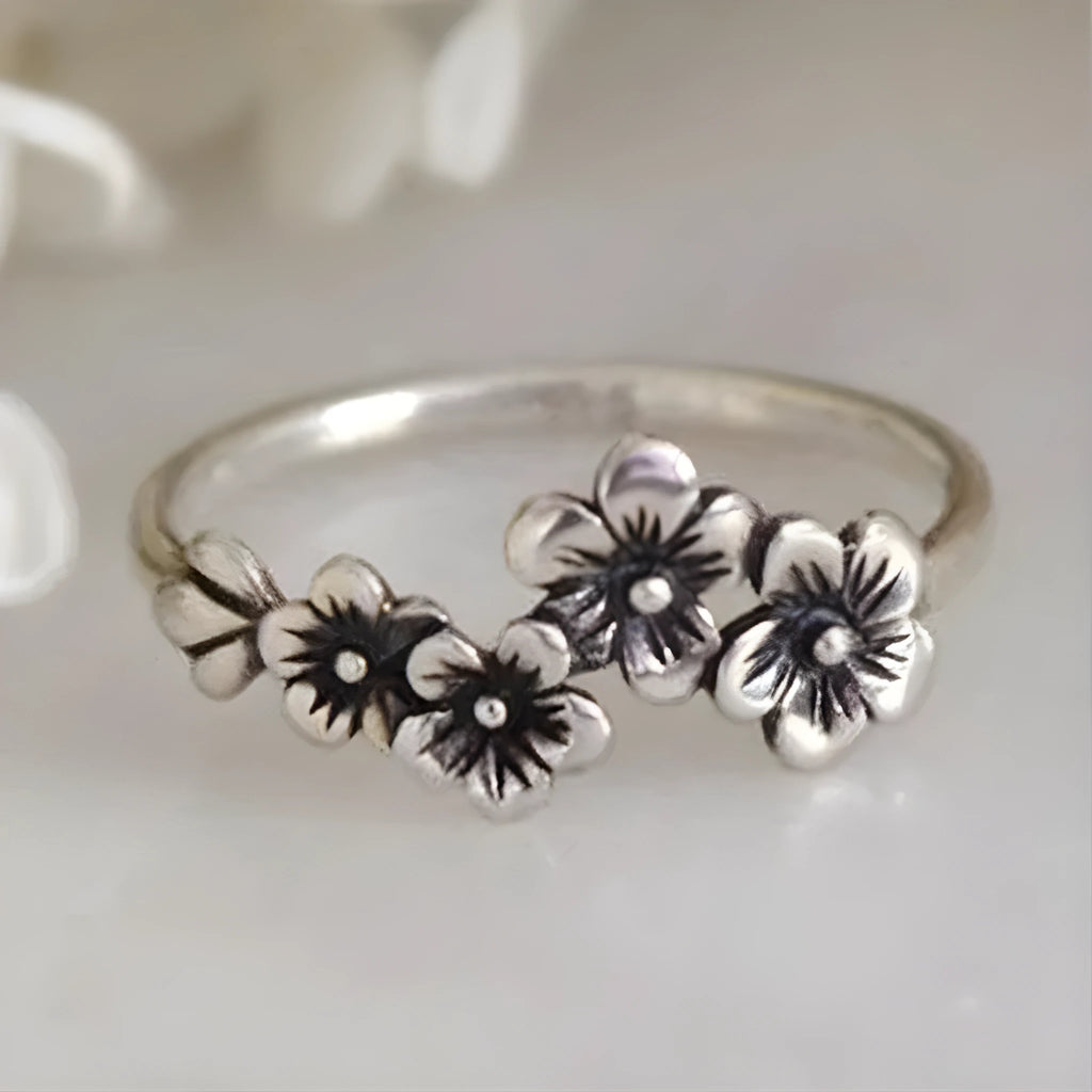 Antique silver alloy geometric ring with retro personality style on white background