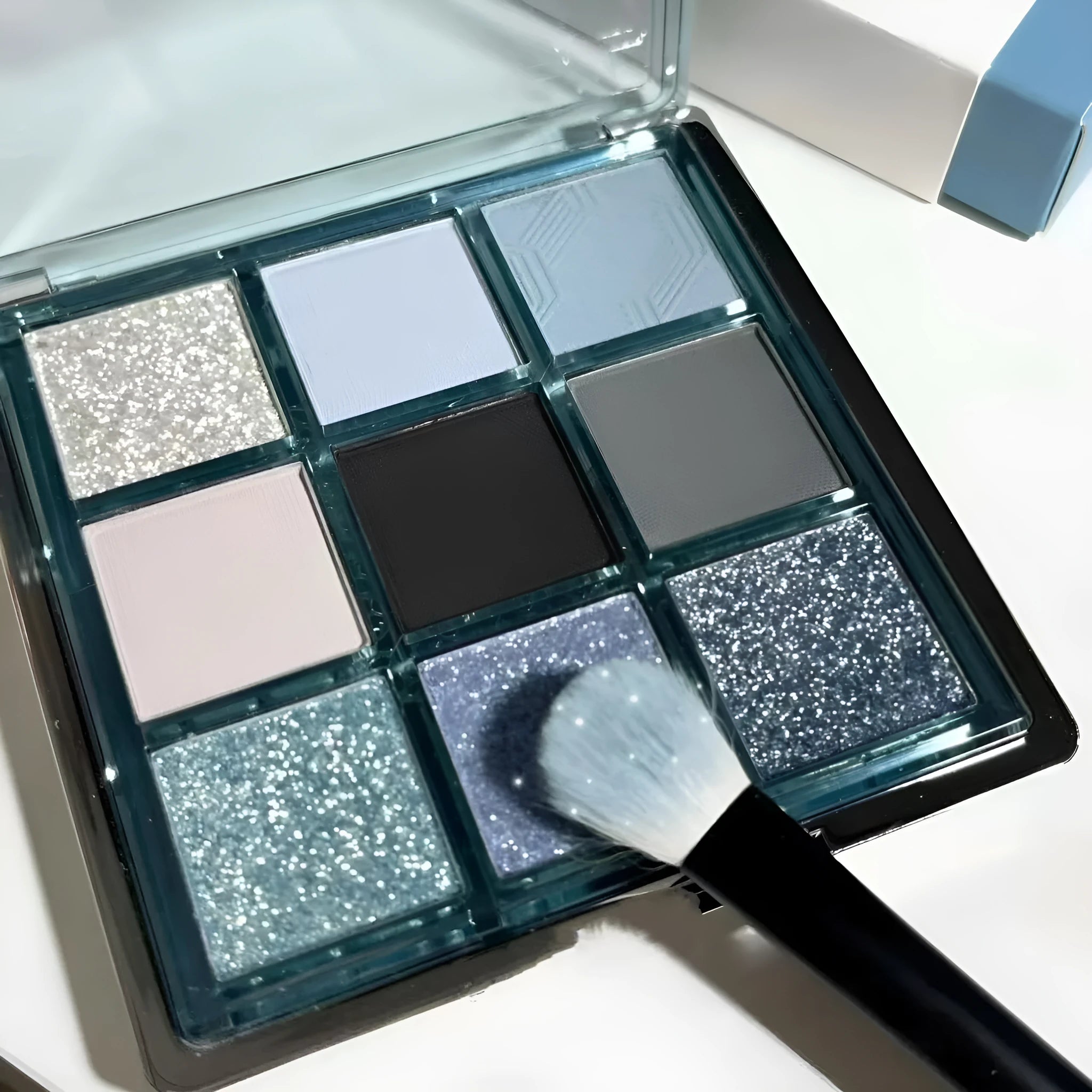 MUGELEEN nine-colour eye shadow palette 08 showing matte, shimmer, and glitter earth tones.