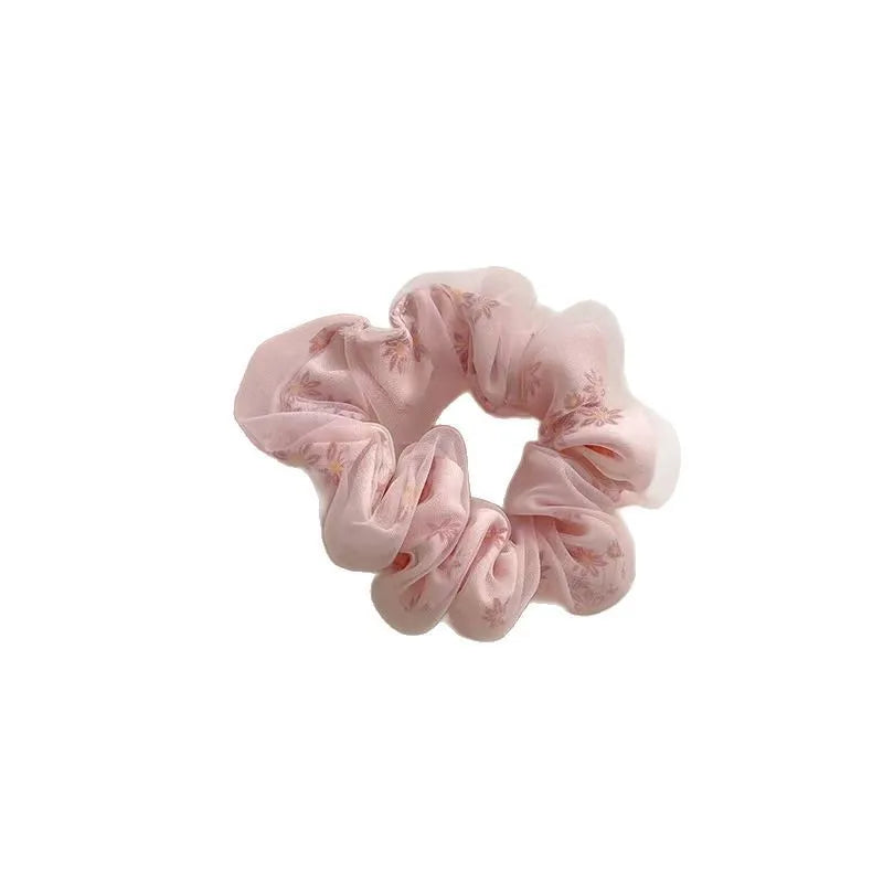 Mesh Sense bun large intestine hair band in milky white, made from soft cloth with a natural style, for women