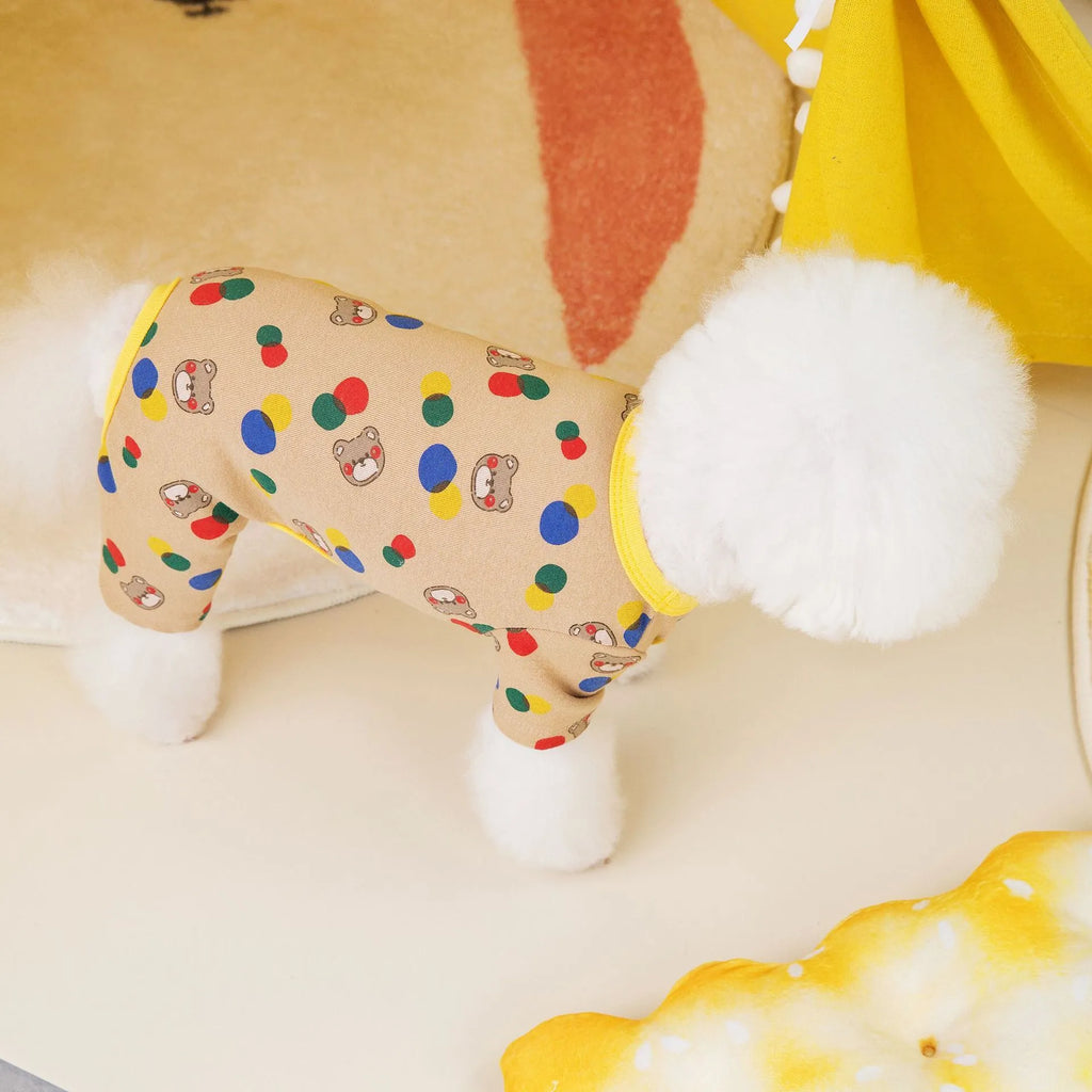Beige dog t-shirt with a colourful cartoon bear print, showing a casual fit on a pet.