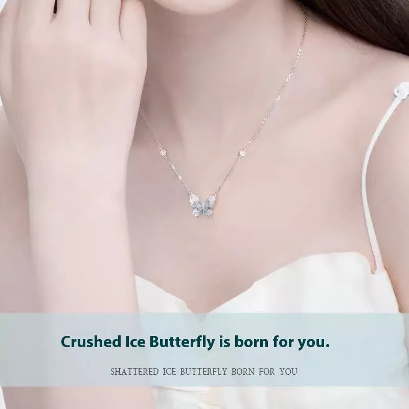 Close-up of a silver Bingyu butterfly pendant necklace on an adjustable O-ring chain.