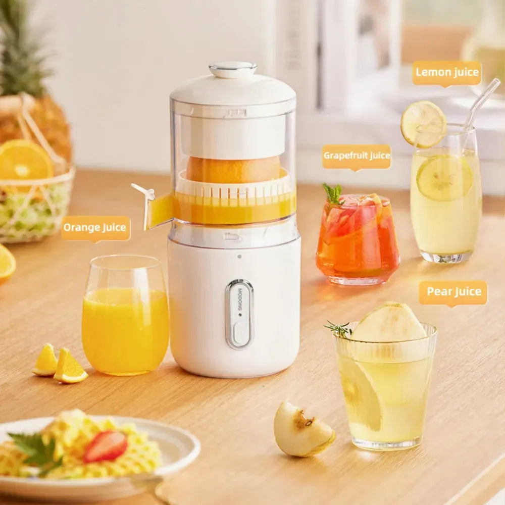 Fresh green portable USB electric juicer for oranges and lemons on a kitchen counter