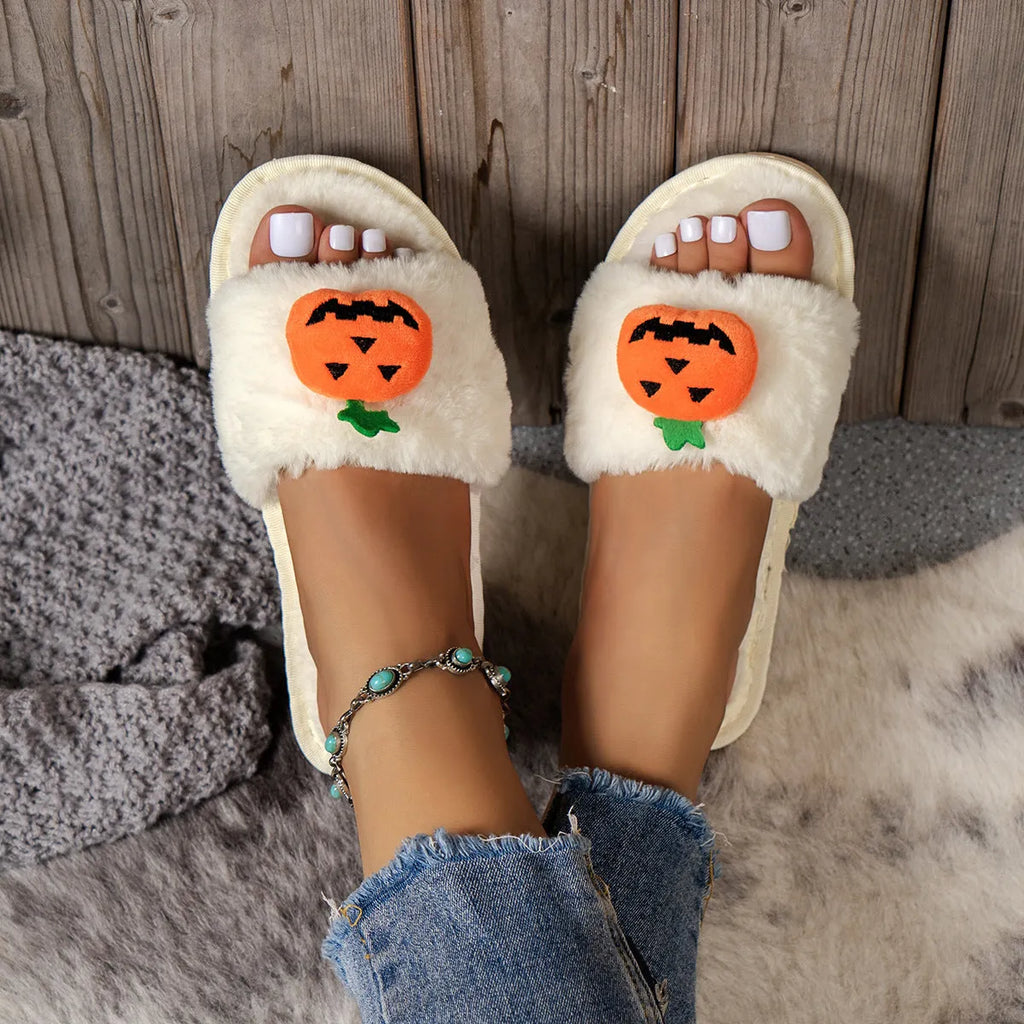 White and yellow Halloween cartoon pumpkin plush open-toe slippers on anti-slip PVC sole.
