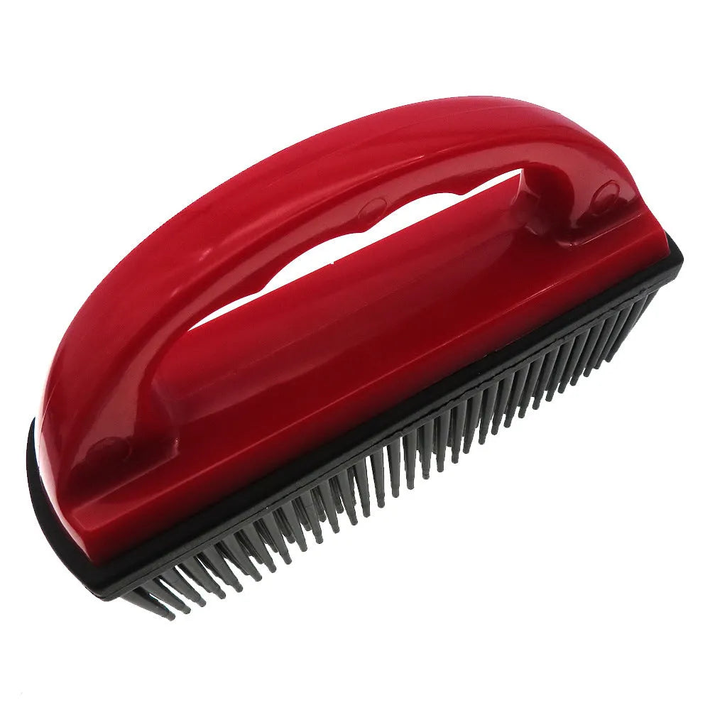 Red silicone pet hair removal brush with oval head measuring 160mm by 85mm.
