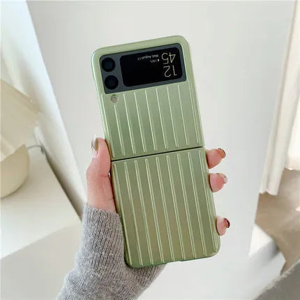 Samsung Z Flip3 folding phone in a slim, solid-colour flip case showing front and back views.