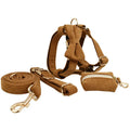 Caramel corduroy five-piece pet collar set with bow, vest, and poop bag on a dog