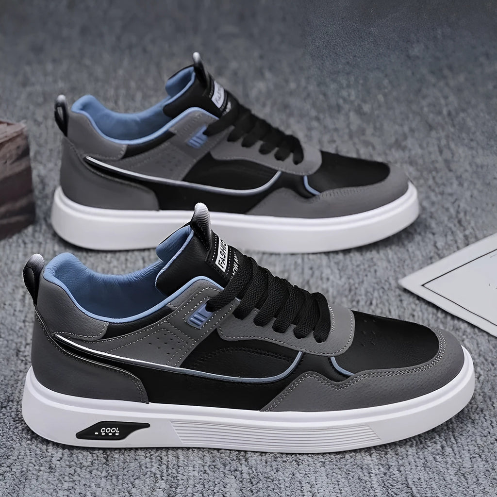 Men's Korean-style canvas board shoes in black with leather stitching details and mesh lining