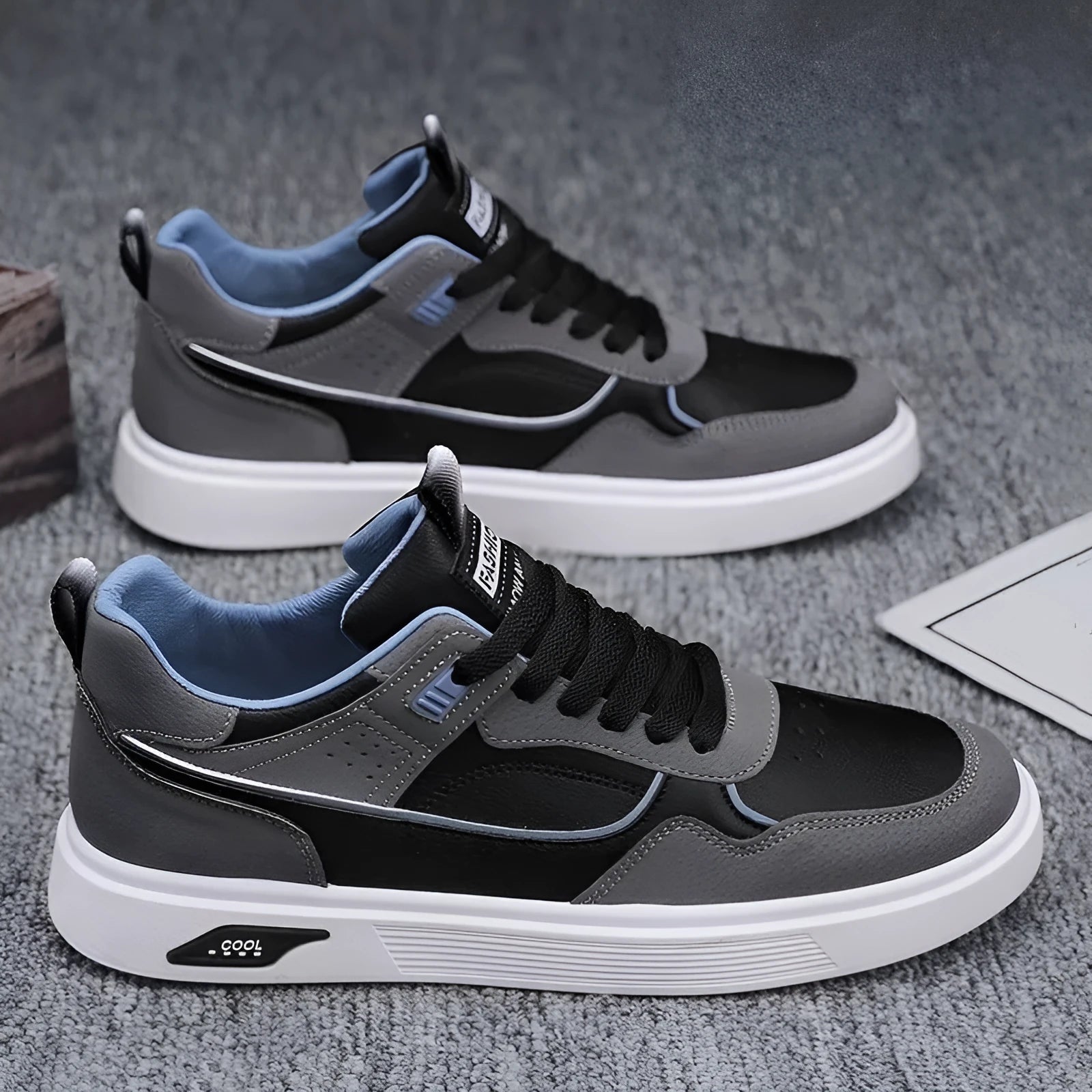 Men's Korean-style canvas board shoes in black with leather stitching details and mesh lining