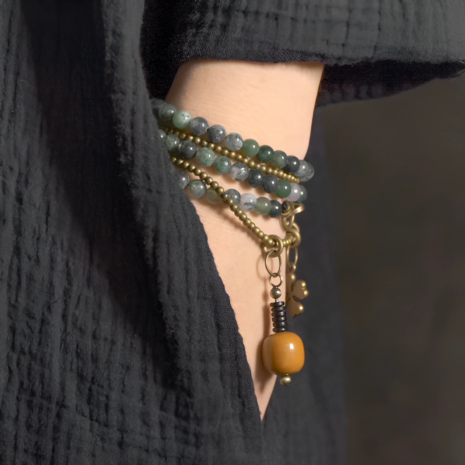 Handcrafted ethnic children's bracelet with natural crystal stones in multi-layered retro design