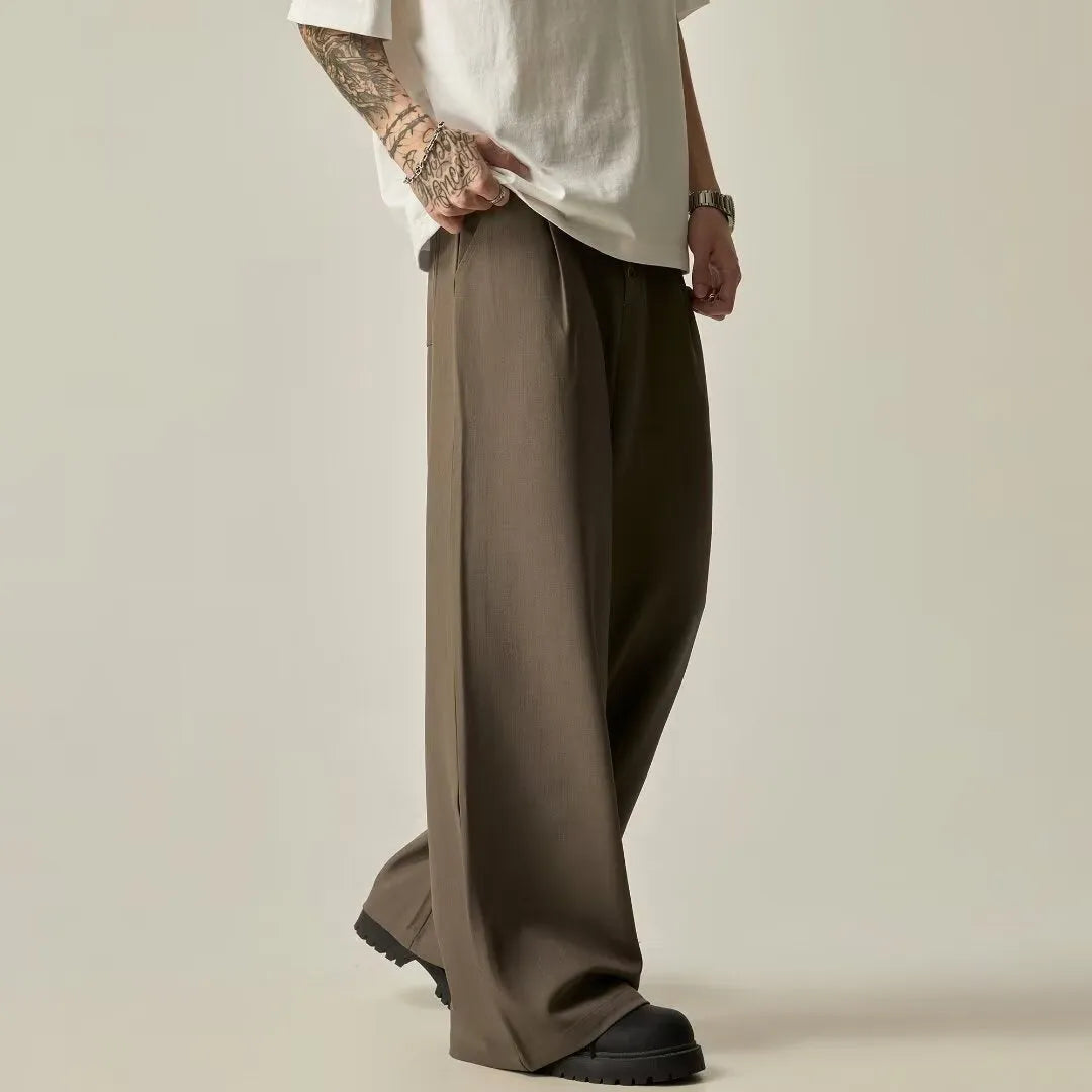 Men's vertical tube wide-leg trousers in solid black colour with micro-elastic waistband