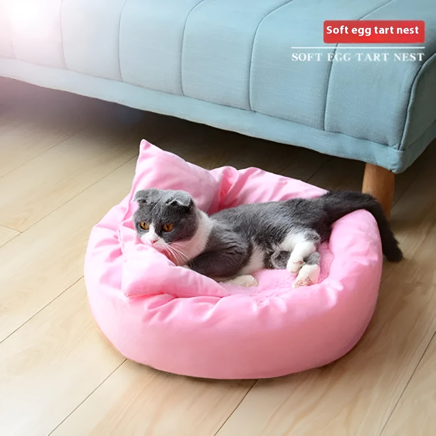 Light grey cloth dog bed with soft PP cotton filling, shown in size L (46cm diameter) on a wooden floor.