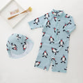 Boys' penguin print long sleeve swimsuit set with matching swimming cap for sun protection