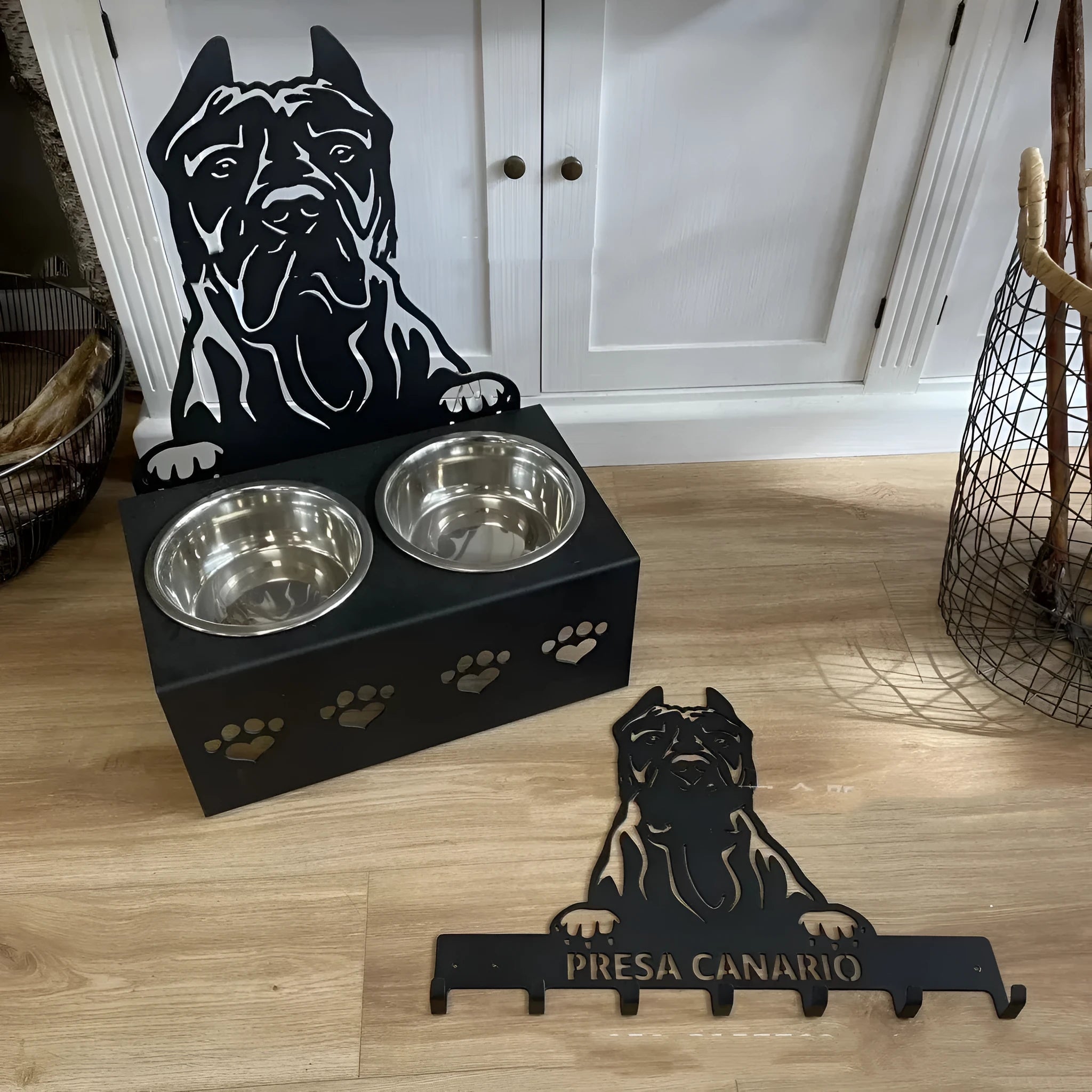 Personalised elevated dog bowl holder with stainless steel bowl in iron frame showing custom name engraving