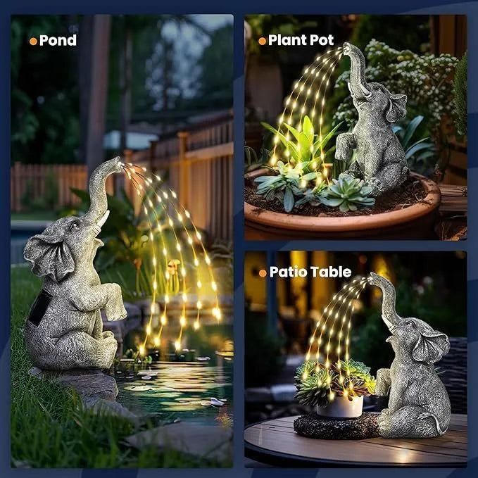 Resin elephant garden statue with built-in LED light strip for outdoor decoration.