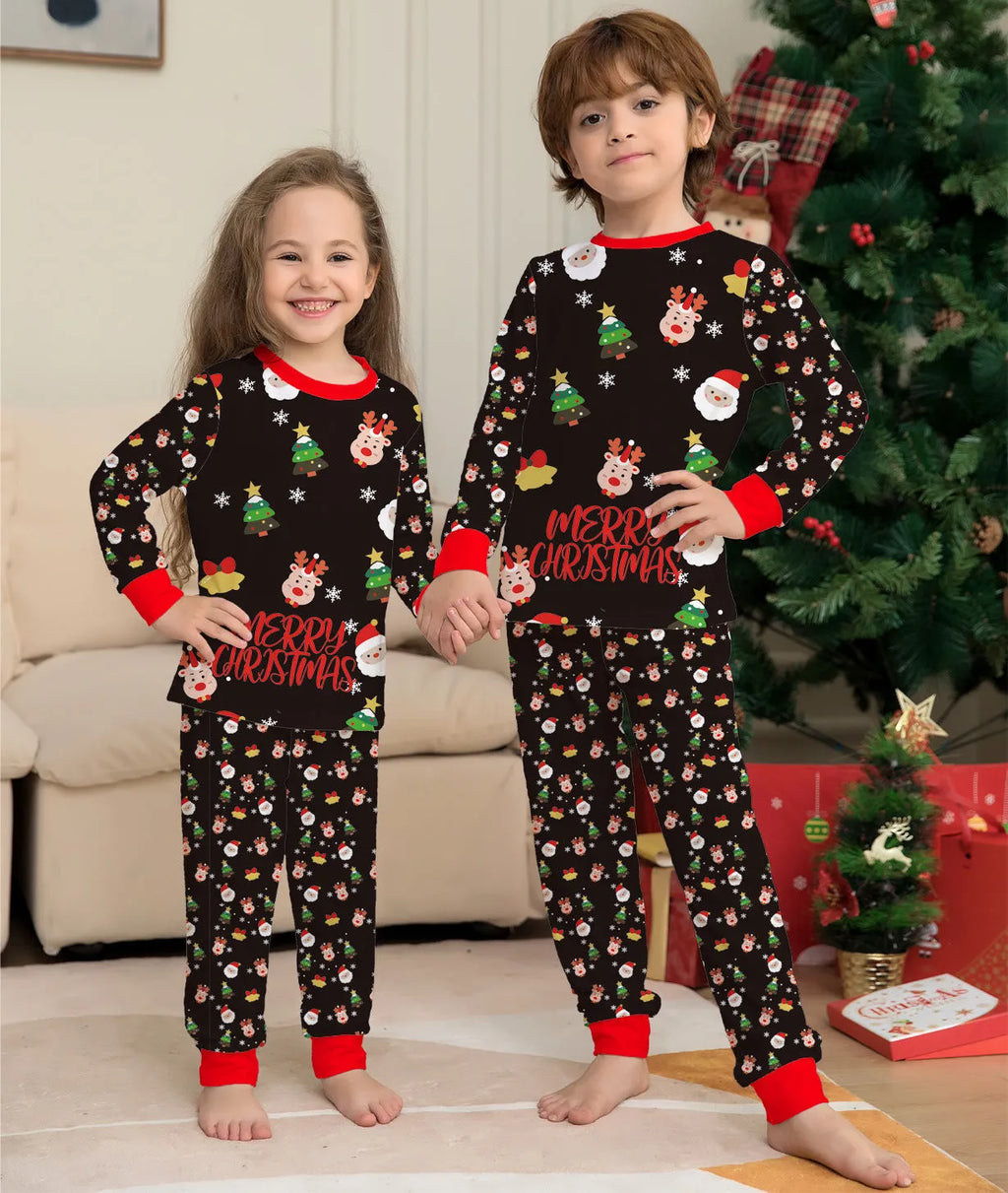 Family wearing matching red plaid Christmas pyjamas with a dog in a matching set.