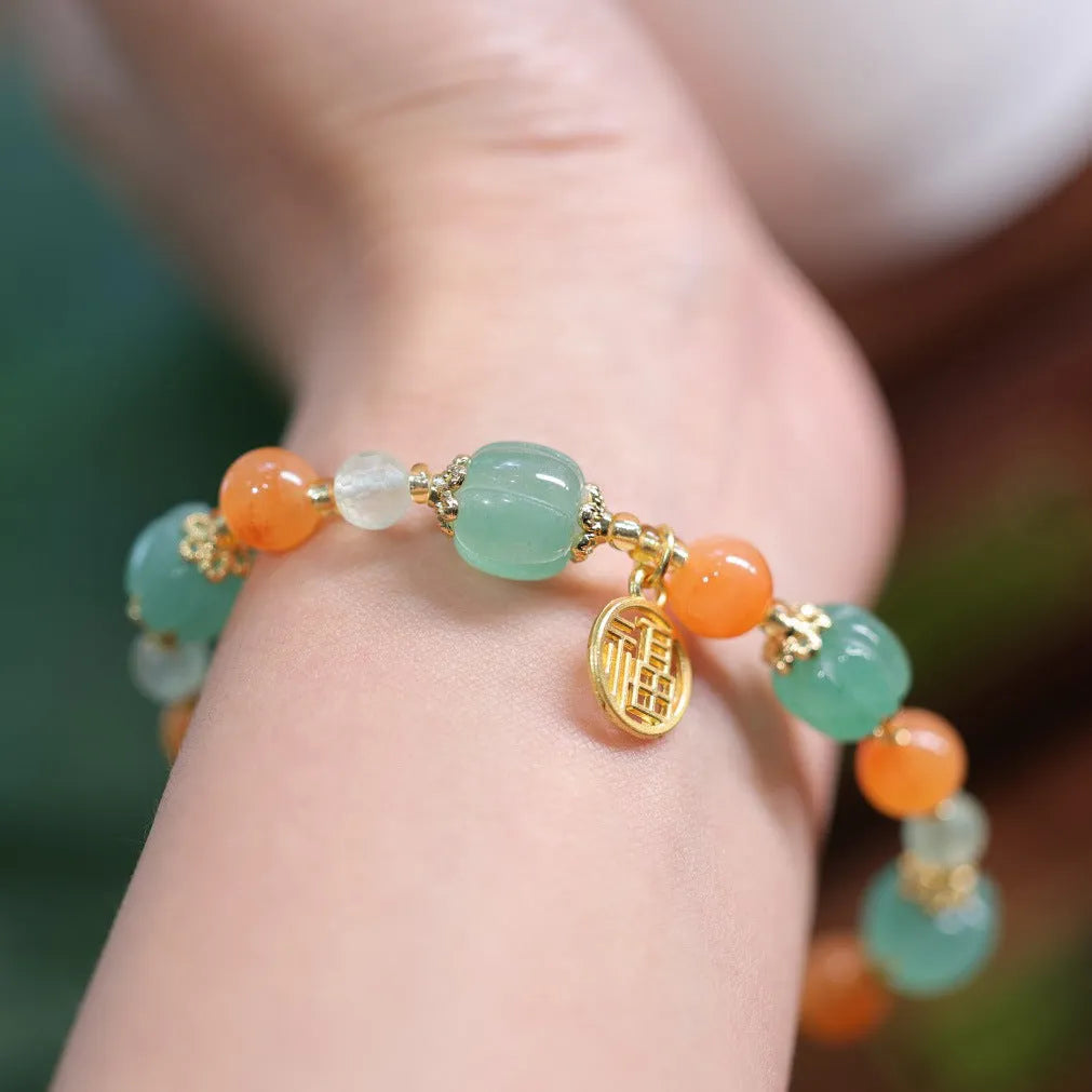 Traditional Chinese Duobao pumpkin bracelet with Jinsi Jade barrel beads and Prehnite accents