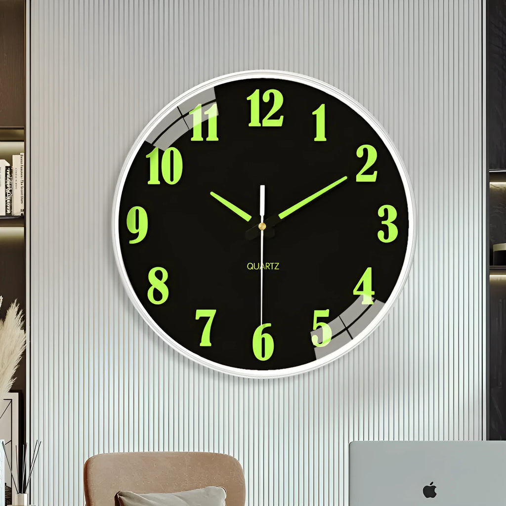 Modern luminous wall clock with plastic shell, 20cm diameter, shown in a room setting.