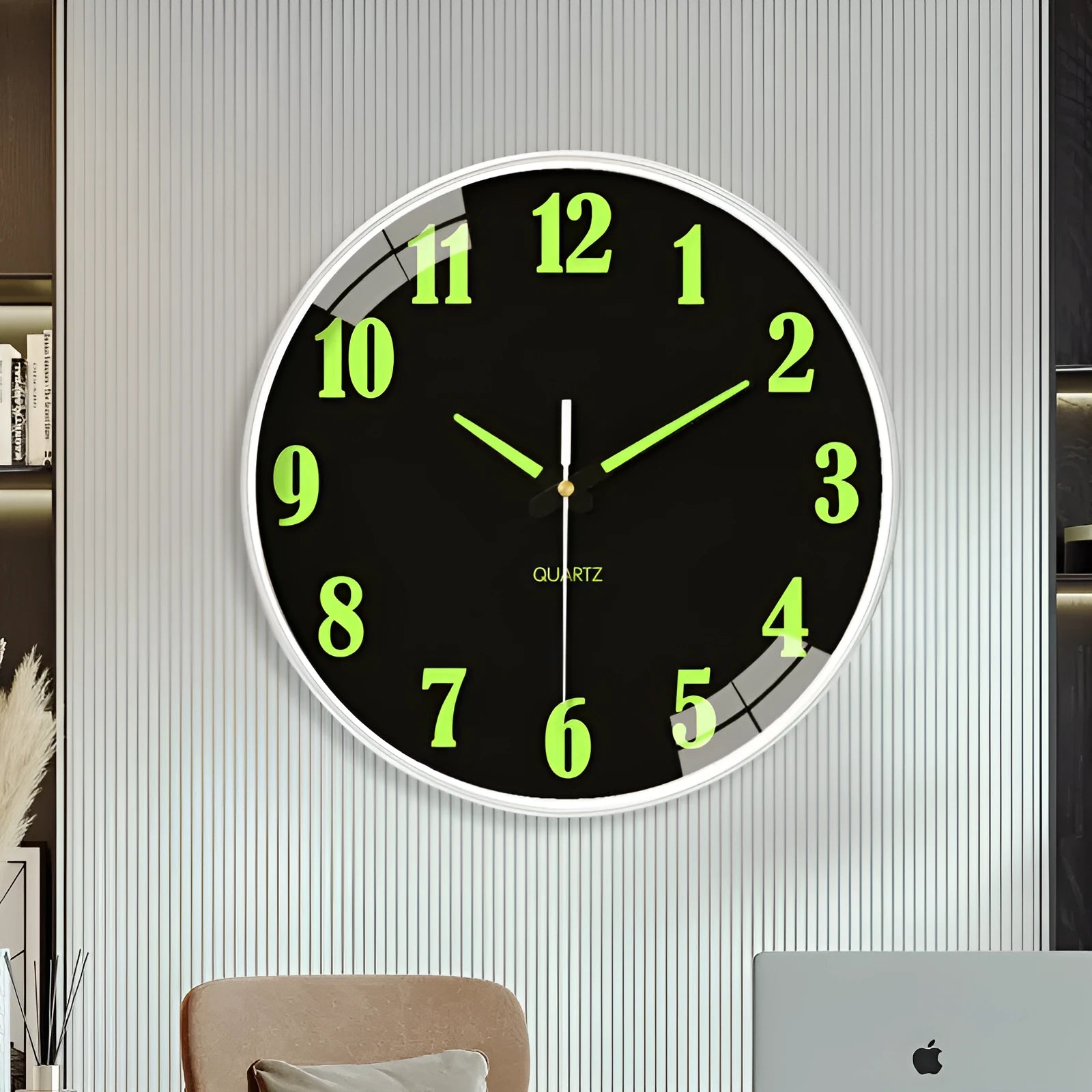 Modern luminous wall clock with plastic shell, 20cm diameter, shown in a room setting.