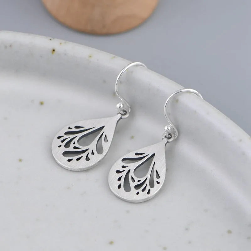 Retro hollow water drops earrings in 925 sterling silver with drop shape design