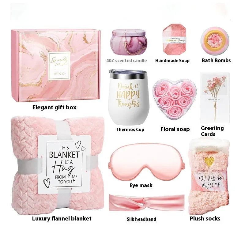 Modern plastic box containing an aromatherapy gift set with scented candles and soap bars.