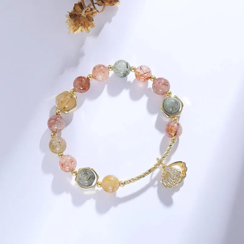 Colourful crystal bracelet with hair crystal shell and red sealant flower shell designs