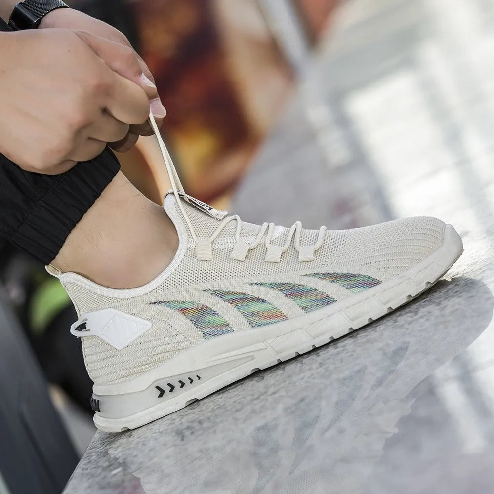 Low-top casual sneakers with mesh upper in colours black, grey, and beige on a flat plastic sole