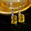 Square crystal fashion earrings in copper with red, yellow, and purple colour options