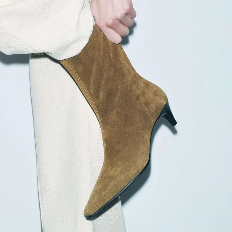 Brown square toe high heel ankle boots with a side zip and a stiletto kitten heel.