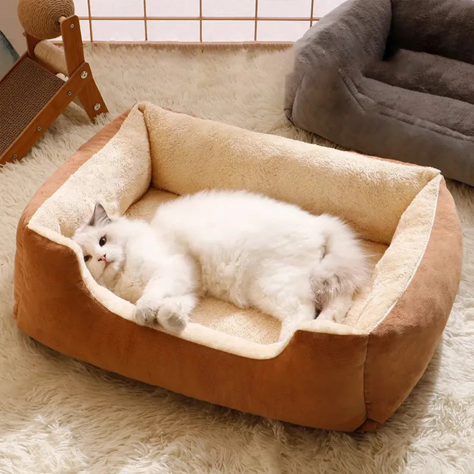 Short plush pet cushion bed for cats and dogs in grey colour, shown in L size 60x45 cm.