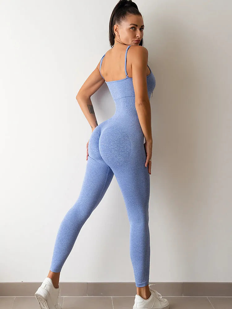 Women's black sleeveless unitard jumpsuit with spaghetti straps and a backless design.