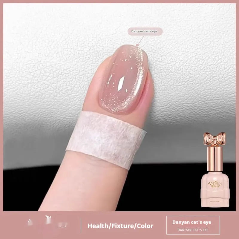 Micro glass bead cat's eye gel nail polish bottle showing cat's eye visual effect