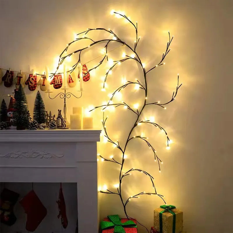 Flexible willow vine Christmas garland with birch bark texture and warm white LED lights extended along wall