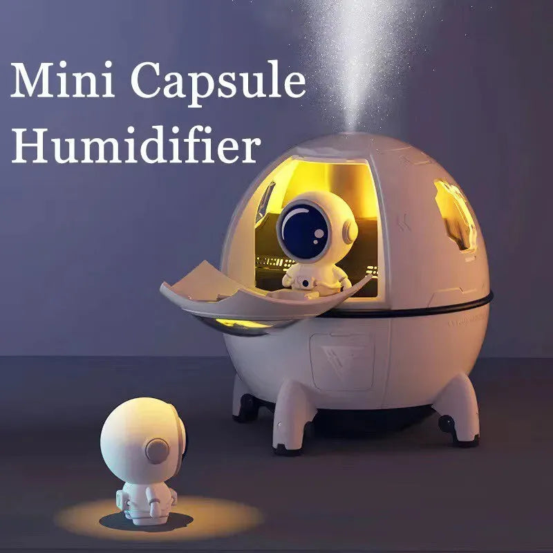 Astronaut-themed portable USB desktop humidifier with colourful LED lights showing 220ml water capacity