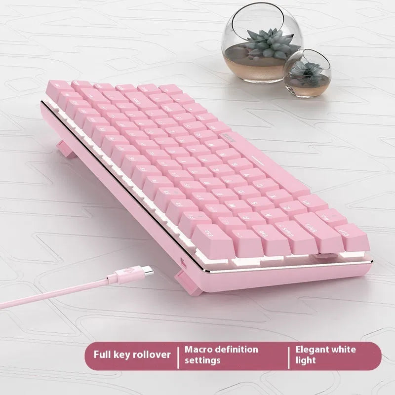 Pink mechanical gaming keyboard with 82 keys and white backlighting