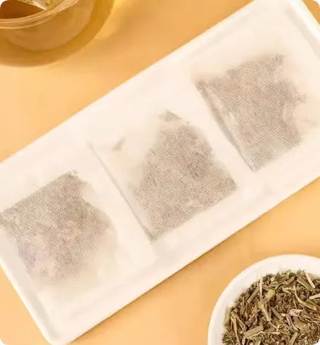 Verbascum Thapsus Tea 20 packs 60g herbal tea bags on a table with a steaming cup