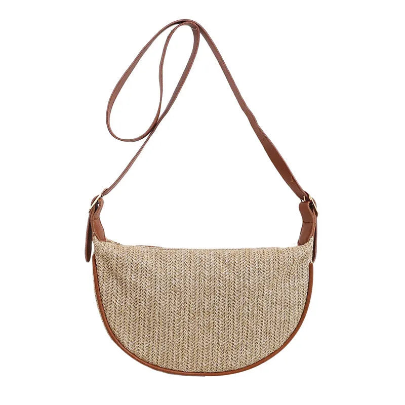 Women's woven straw crossbody bag showing internal phone and document pockets in corrugated brown colour