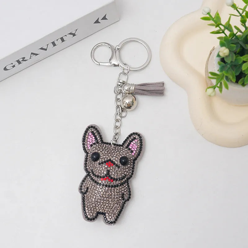 Rhinestone cartoon French bulldog keychain pendant on a diamond-shaped alloy base.