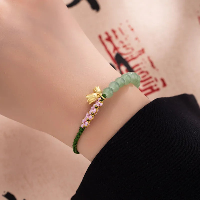 Lily hand woven red rope bracelet with flower elements and national style design