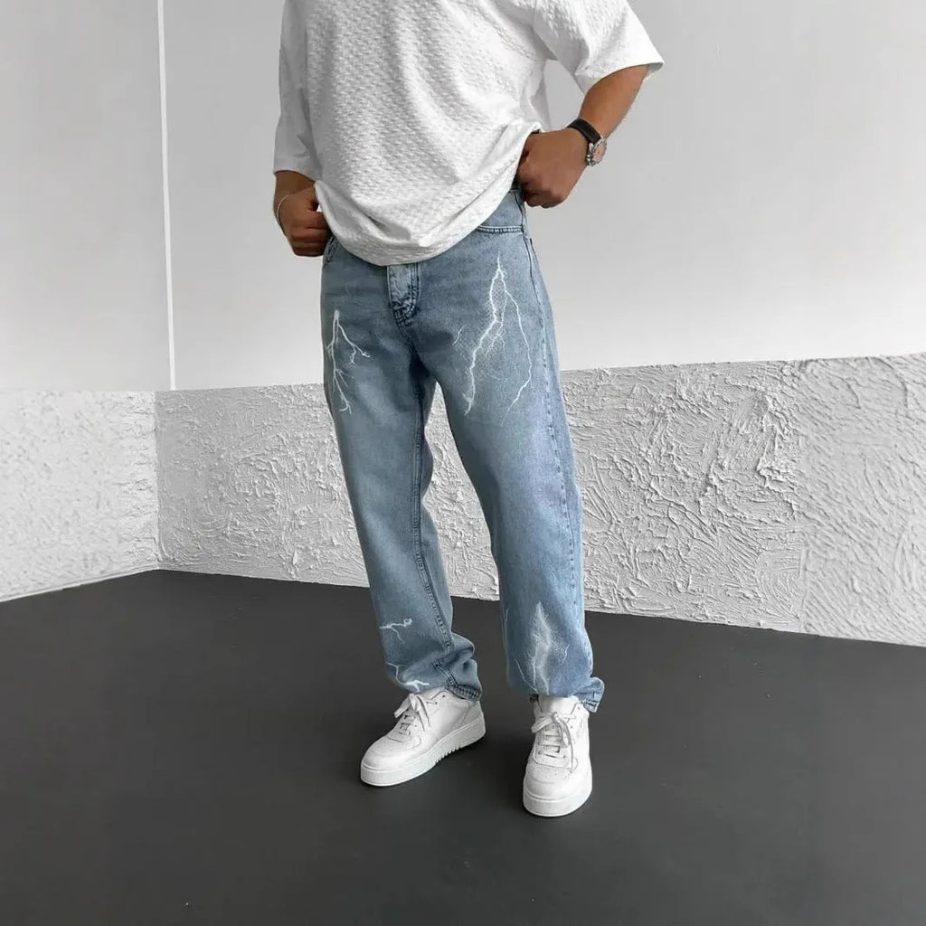 Men's blue straight-leg denim jeans with wide-leg fit and medium elasticity