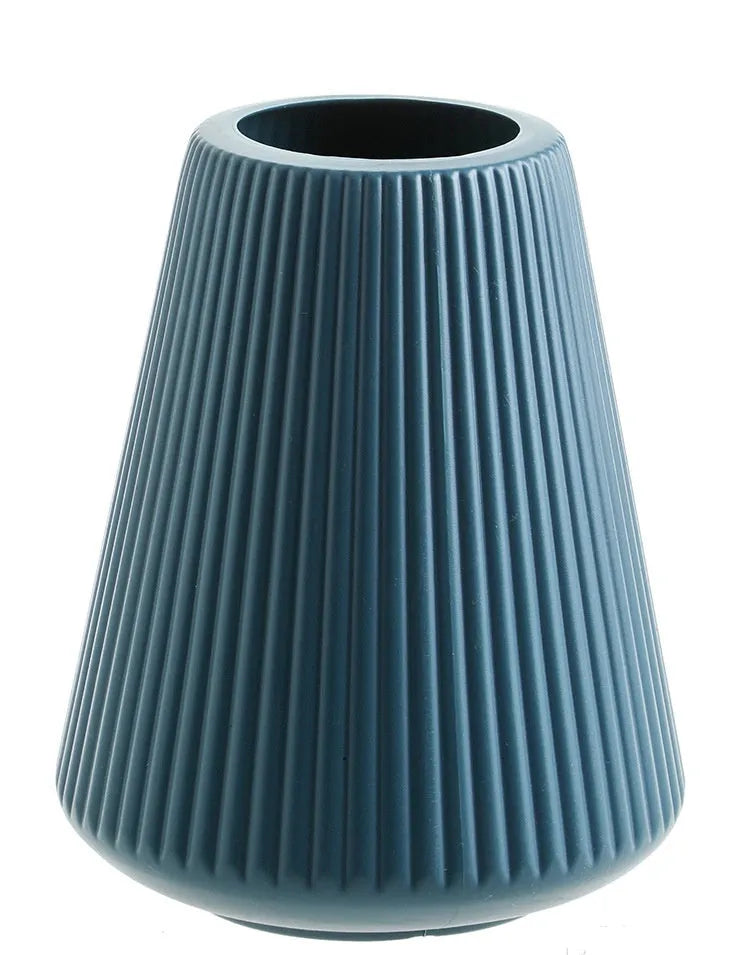 Blue melamine plastic decorative flower vase measuring 16cm by 20cm on a desktop