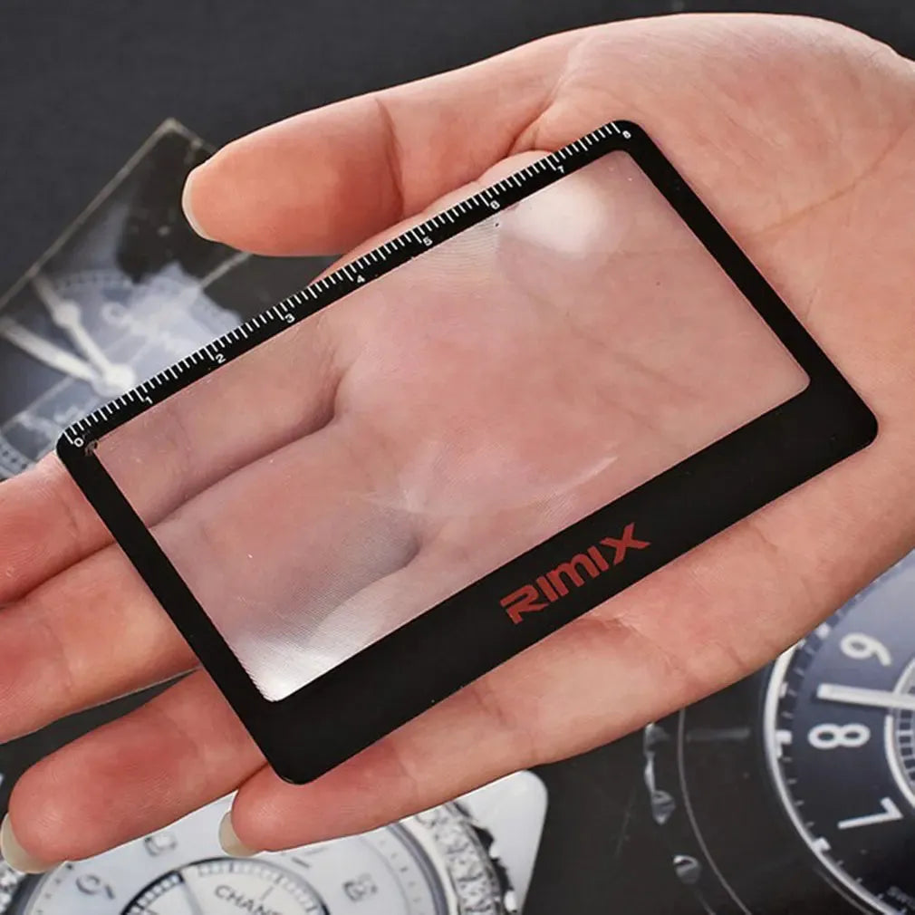 Black and white portable card magnifier with LED light measuring 60 by 40mm for reading small text