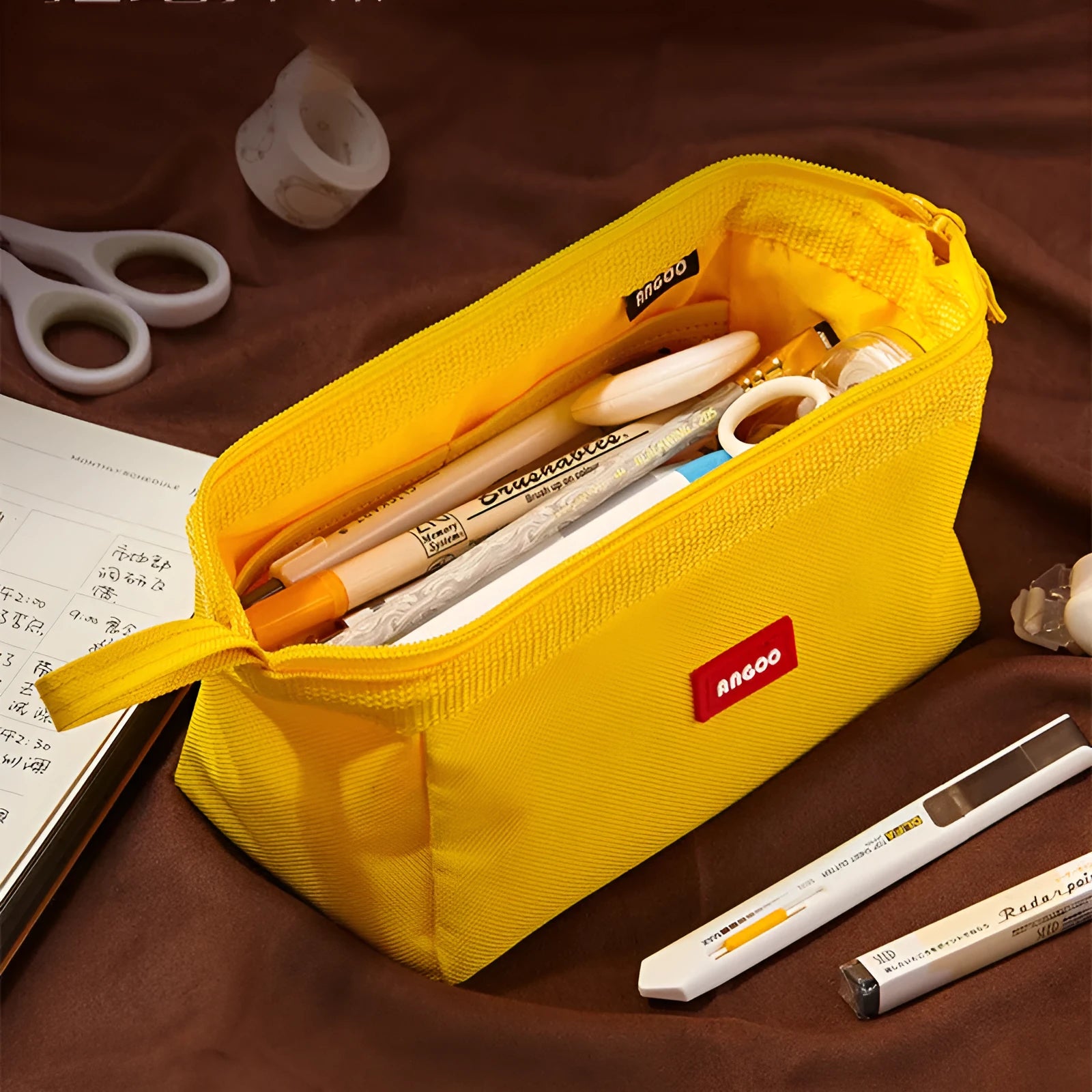 Large canvas pencil case with double zipper in yellow, black, and dark blue colour options