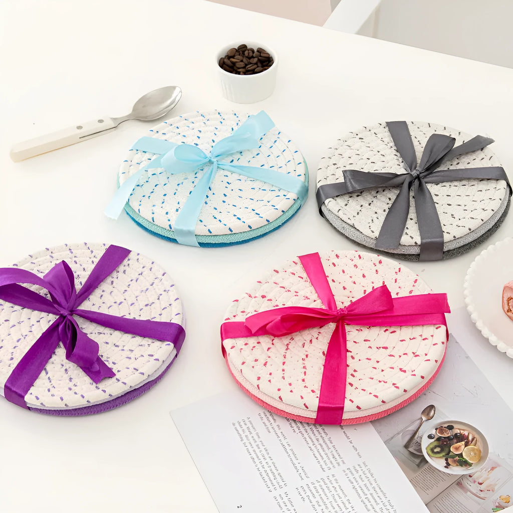 Three round 18cm cotton cord coaster placemats in modern minimalist design