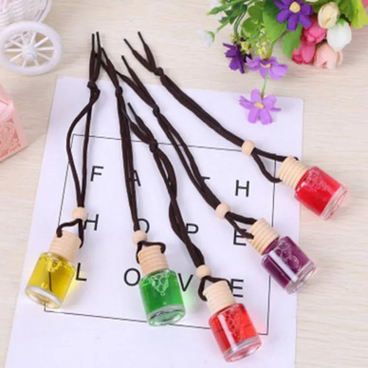 Glass bottle car air freshener hanging ornament with choice of six 55g scents.